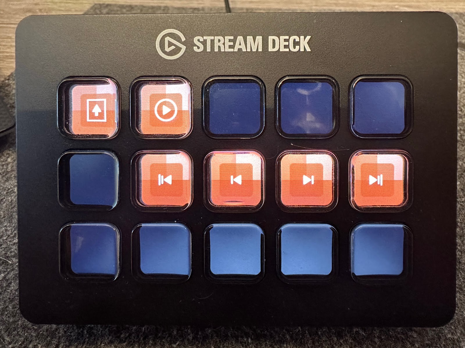 James's photo of his Stream Deck while running PowerPoint, keys showing orange slideshow and navigation controls.